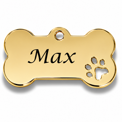 Gold bone-shaped pet tag with 'Max' engraved on a white background